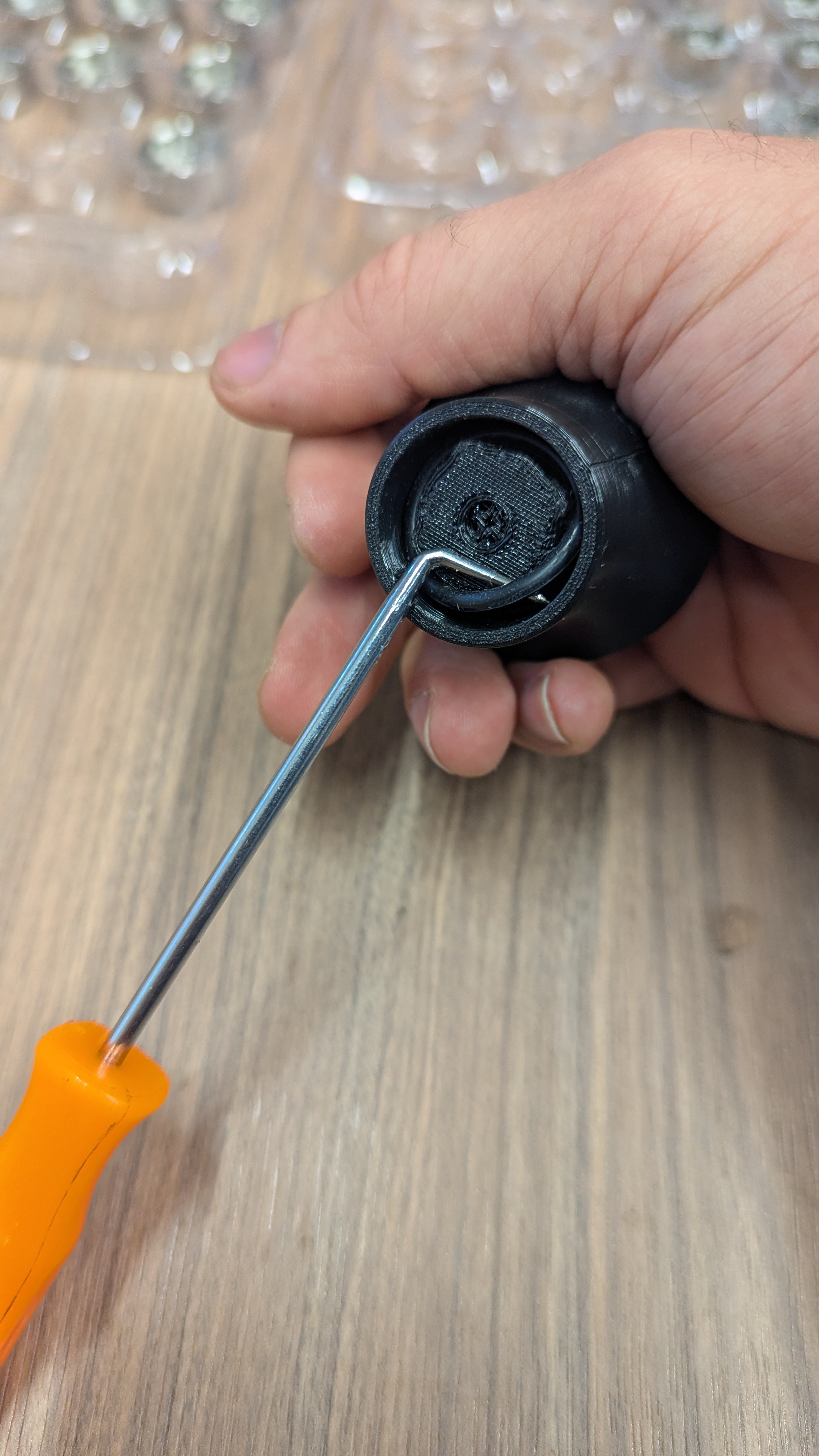 Bottom view of handle showing factory black O-ring that needs to be removed